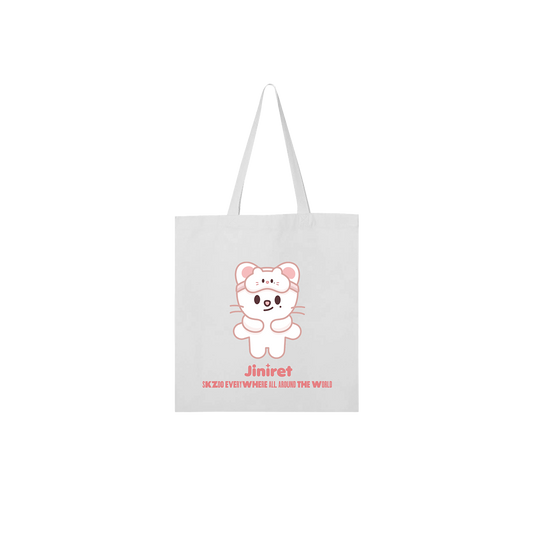 White tote bag with a cartoon character and 'Jiniret' branding 